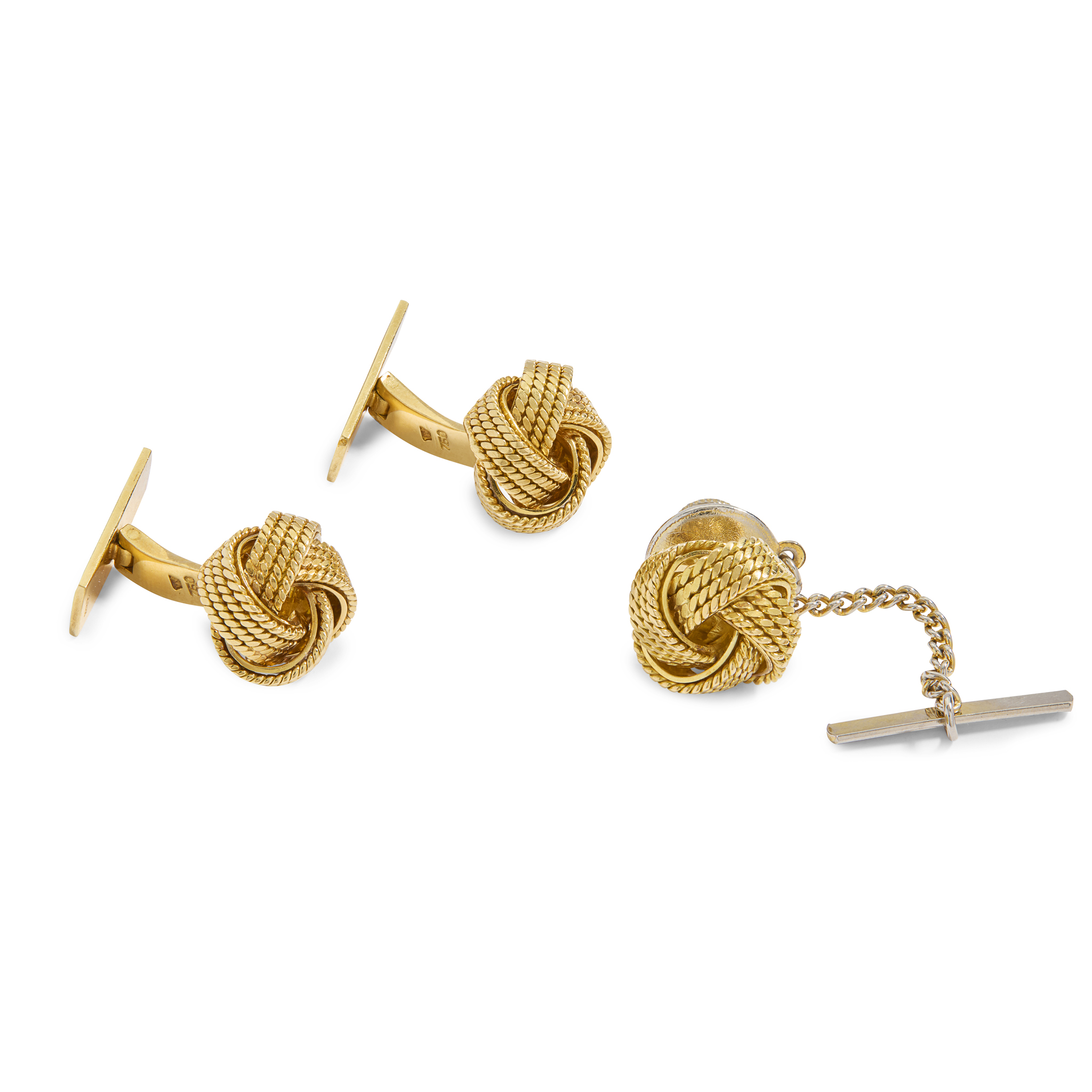 A pair of 18ct gold cufflinks and a dress shirt stud