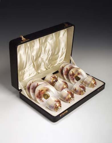 A Royal Worcester boxed coffee set, by James Stinton,