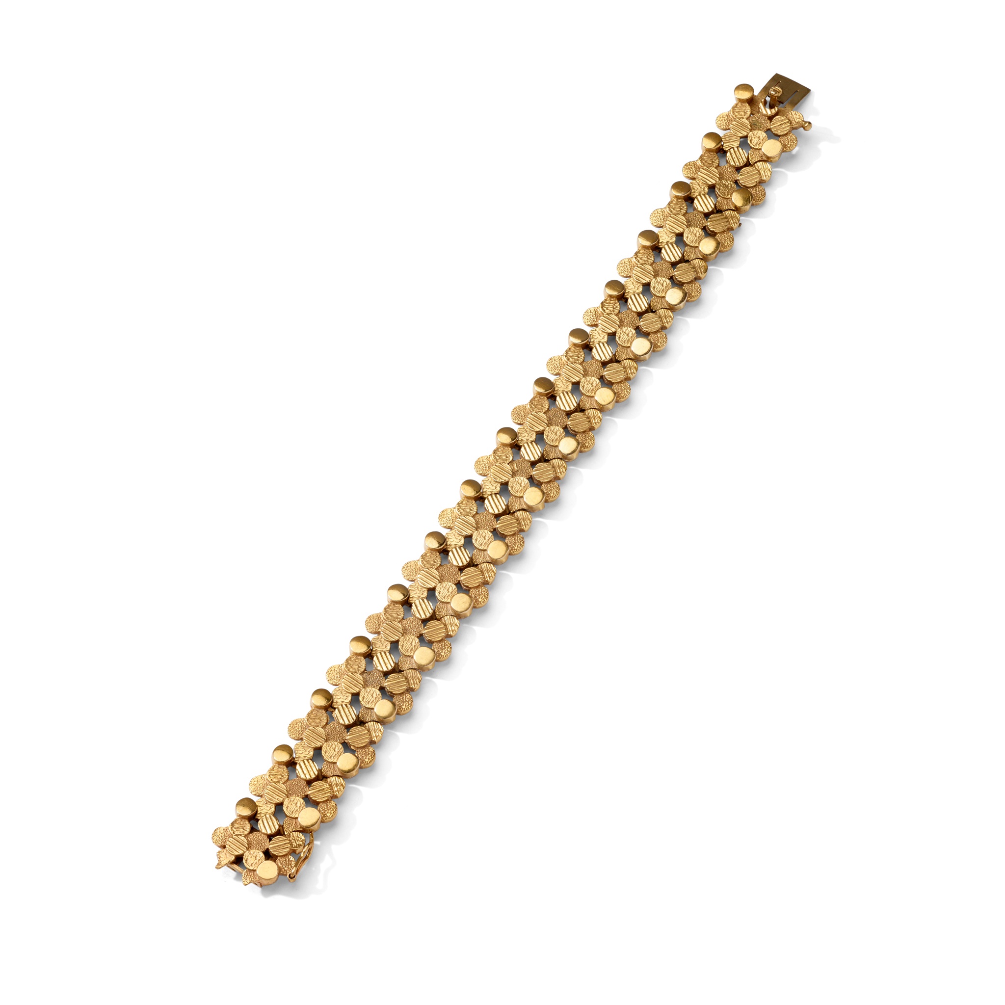 A 9ct gold fancy-link bracelet, 1975