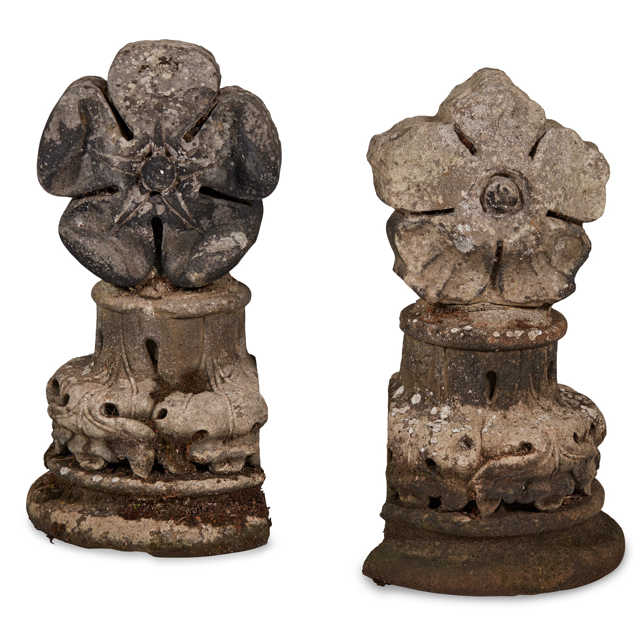 PAIR OF CARVED STONE ROSE-DECORATED FINIALS