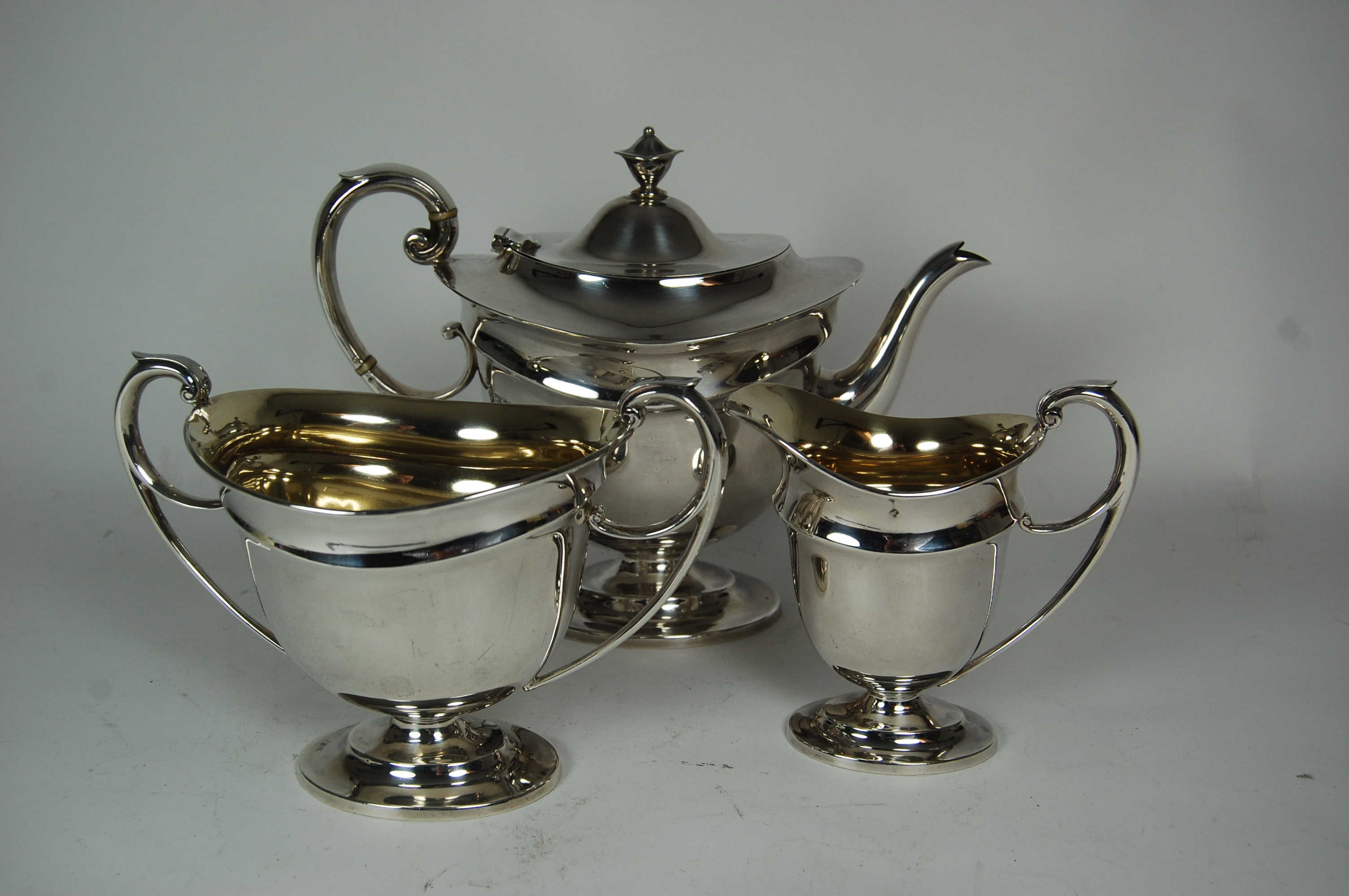 An Edwardian three piece tea service