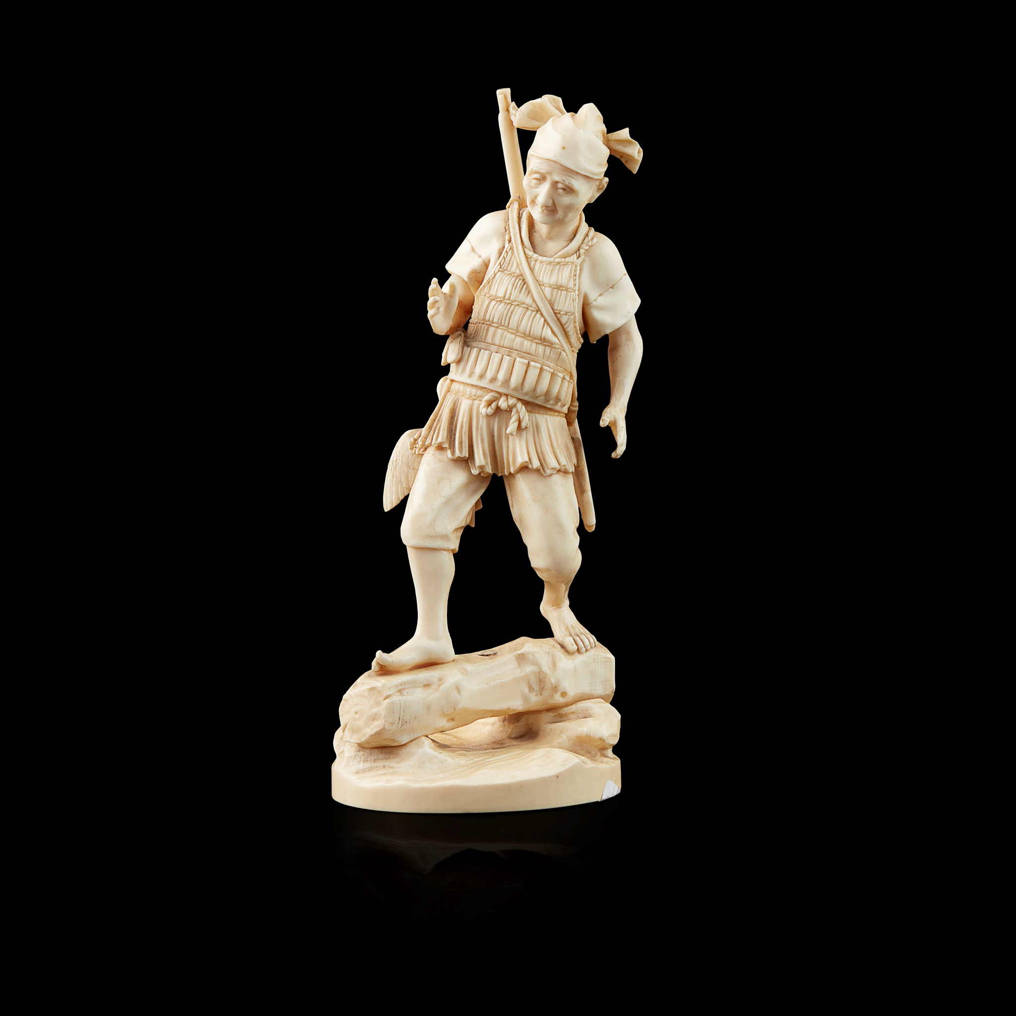 IVORY OKIMONO OF A HUNTER