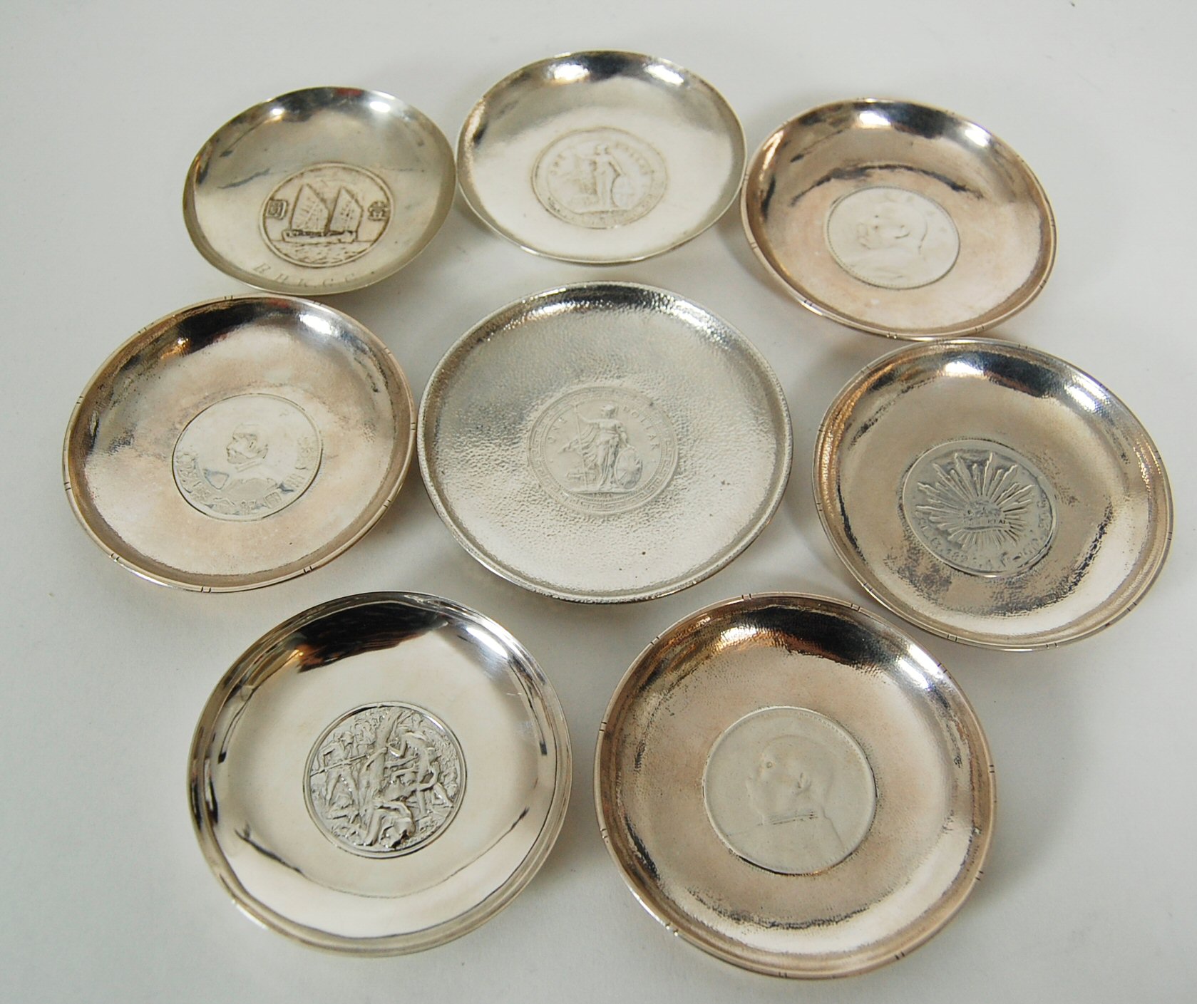 COLLECTION OF CHINESE EXPORT SILVER COIN SET PIN DISHES