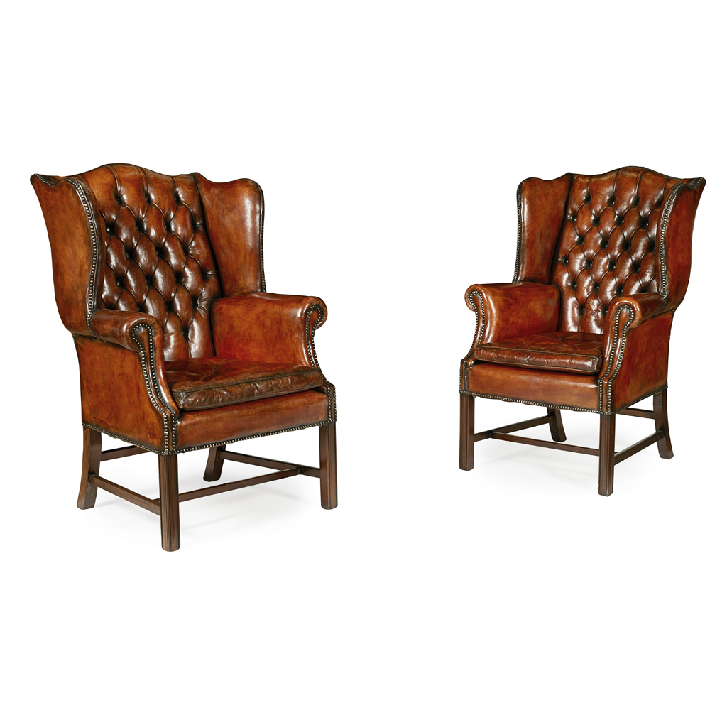 PAIR OF GEORGIAN STYLE LEATHER WING ARMCHAIRS
