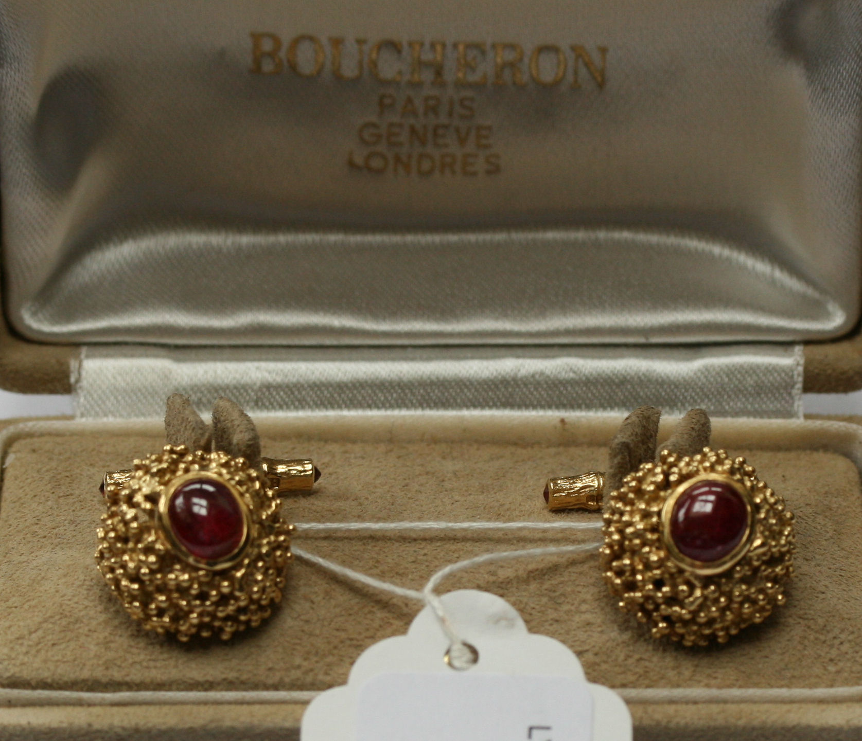 A pair of 1970's 18ct gold ruby set cufflinks