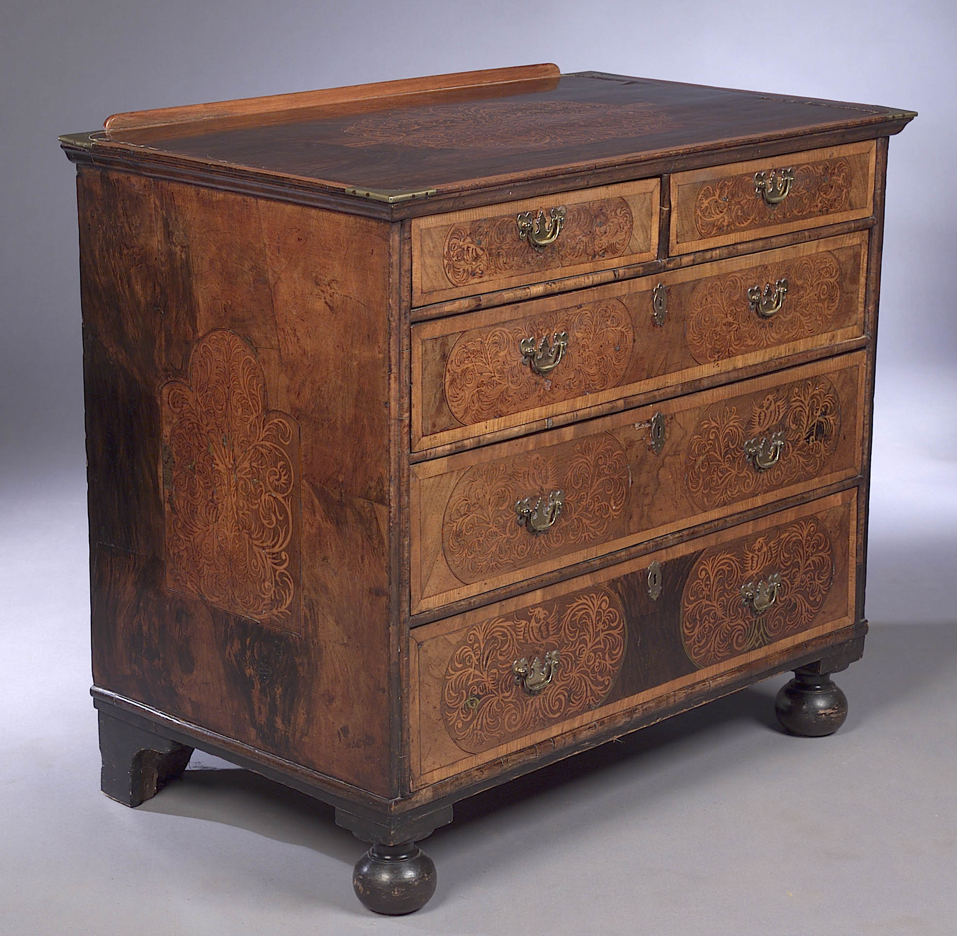 A William and Mary style walnut and marquetry chest