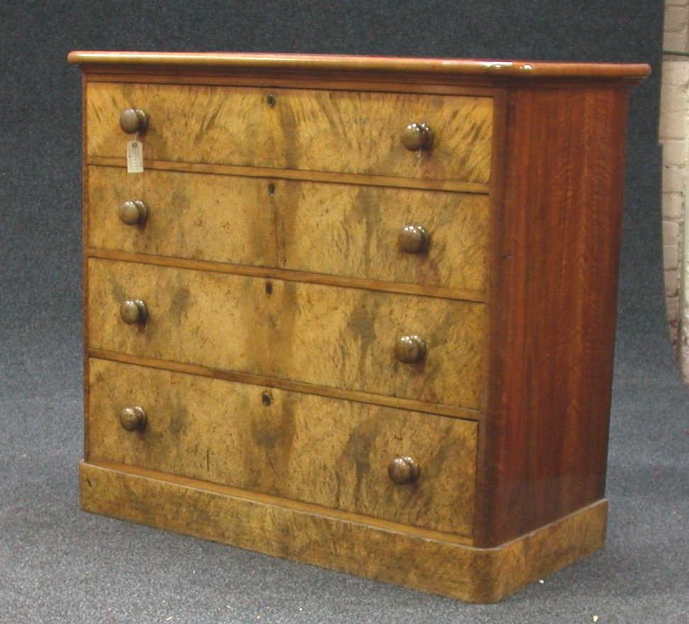 A Victorian walnut chest of drawers,