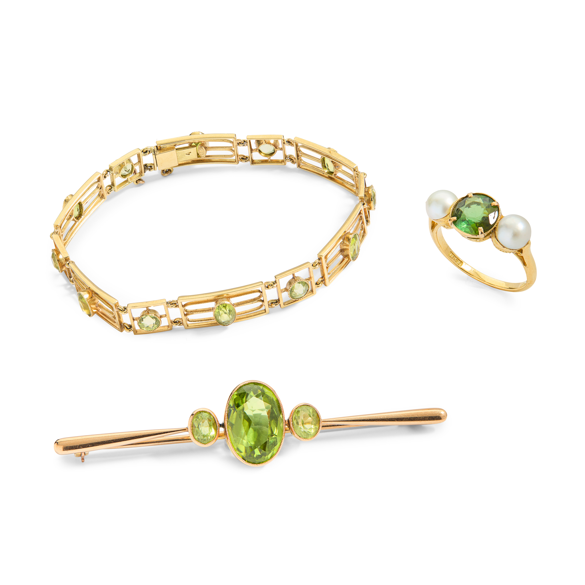 A peridot bracelet and brooch, together with a tourmaline ring