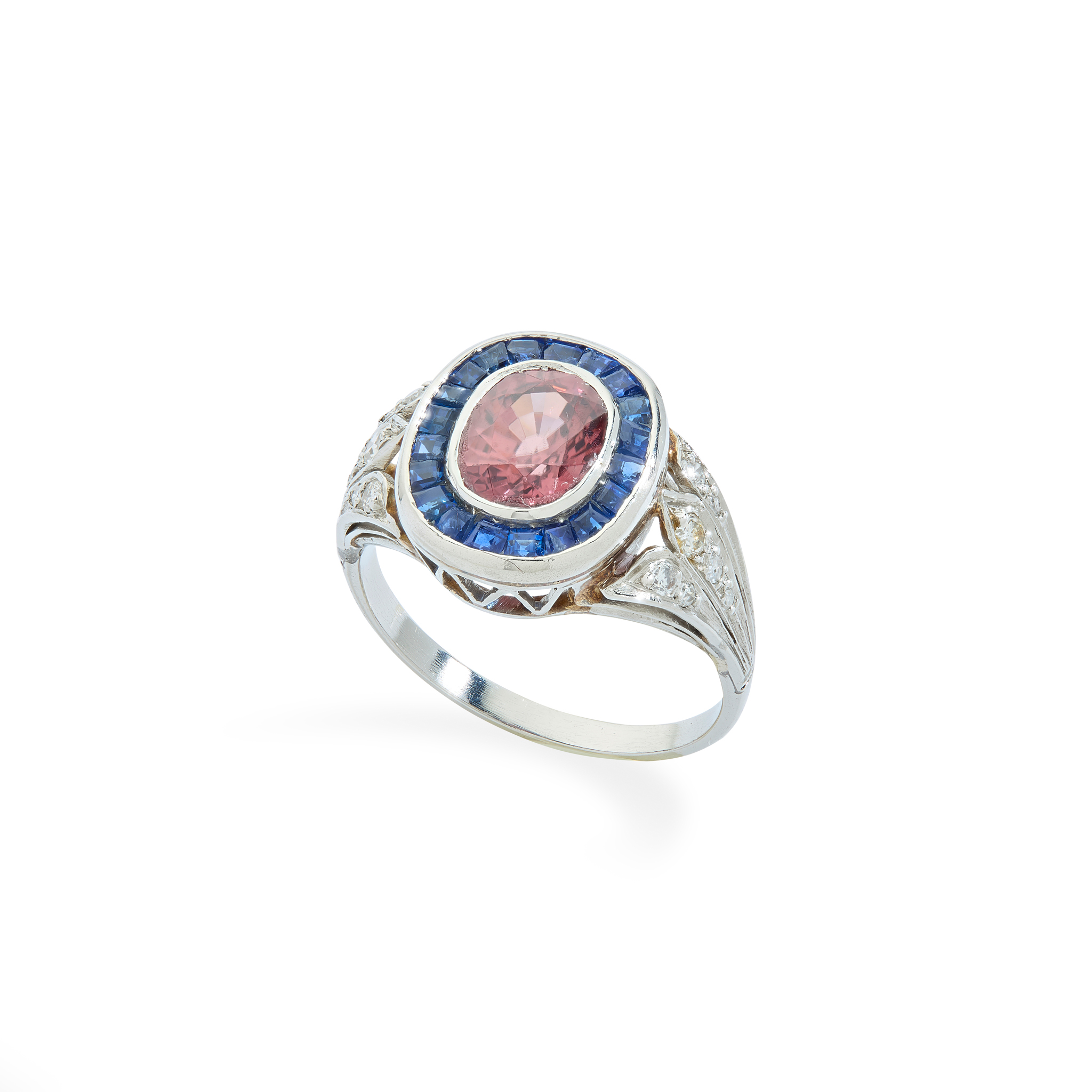 A pink zircon, sapphire and diamond dress ring