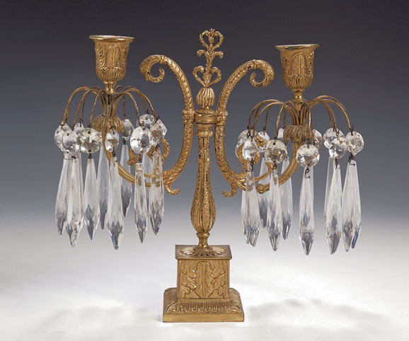 A Regency gilt brass candelabra