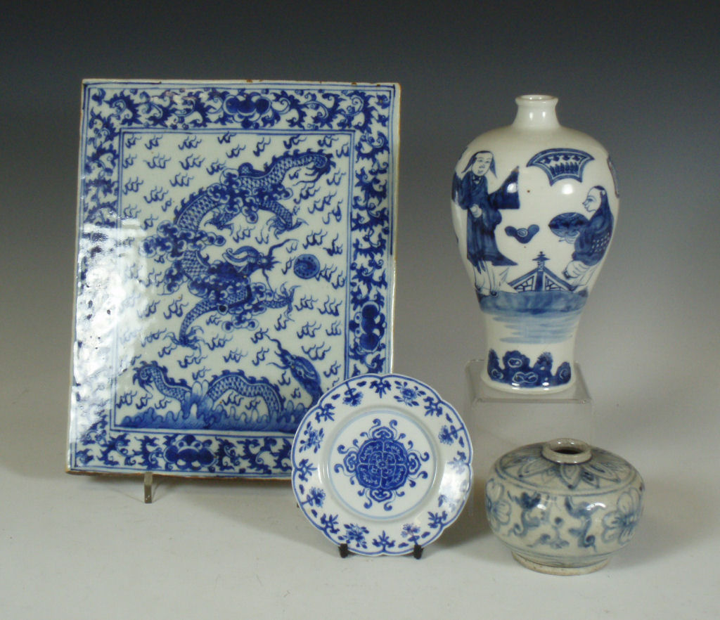 A Chinese blue painted tile