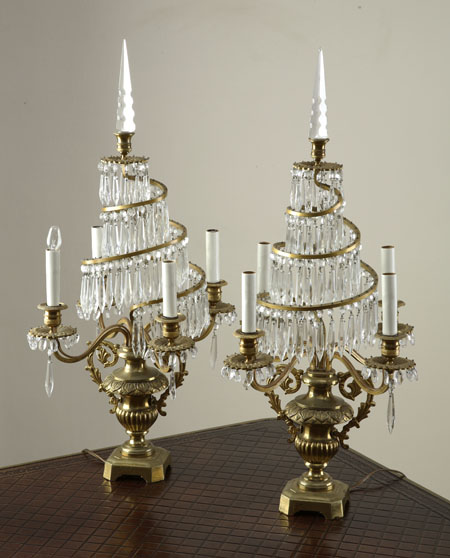 A pair of gilt brass candelabra