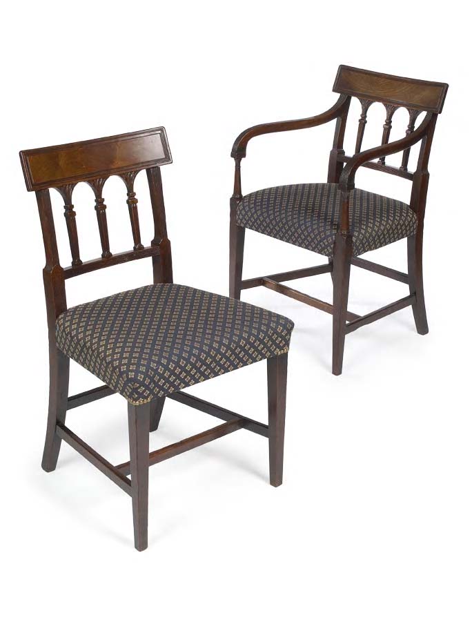 A set of eight George III period mahogany dining chairs