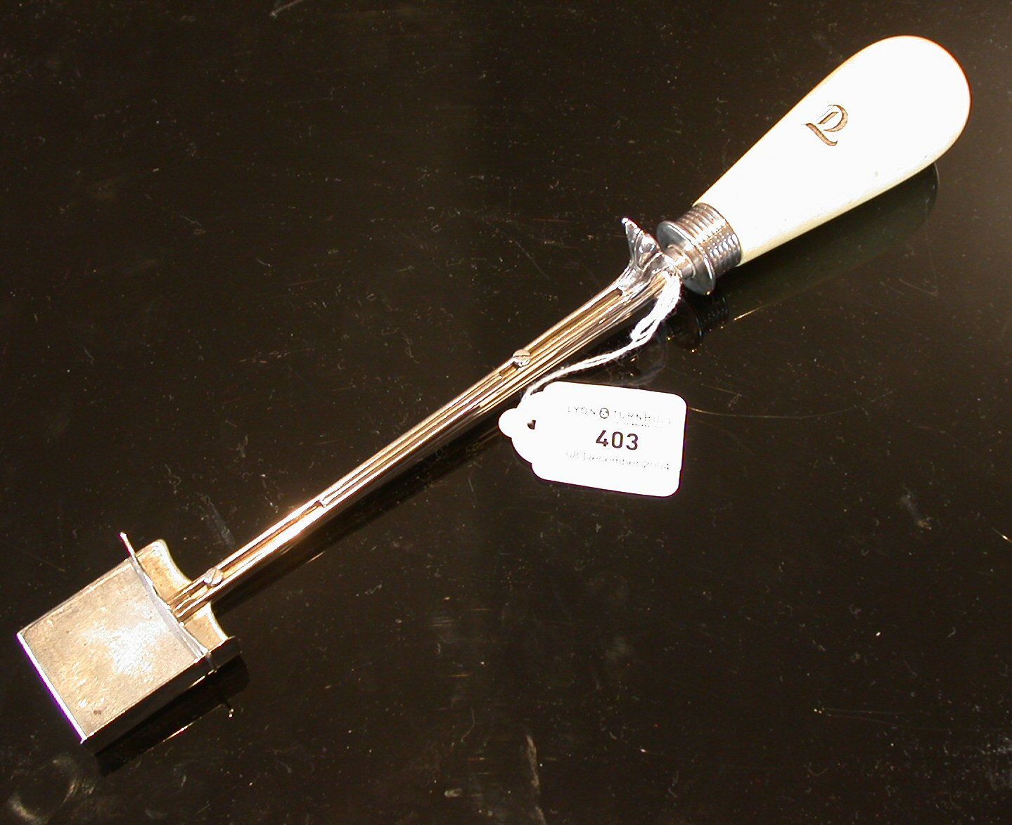 A Victorian cheese scoop