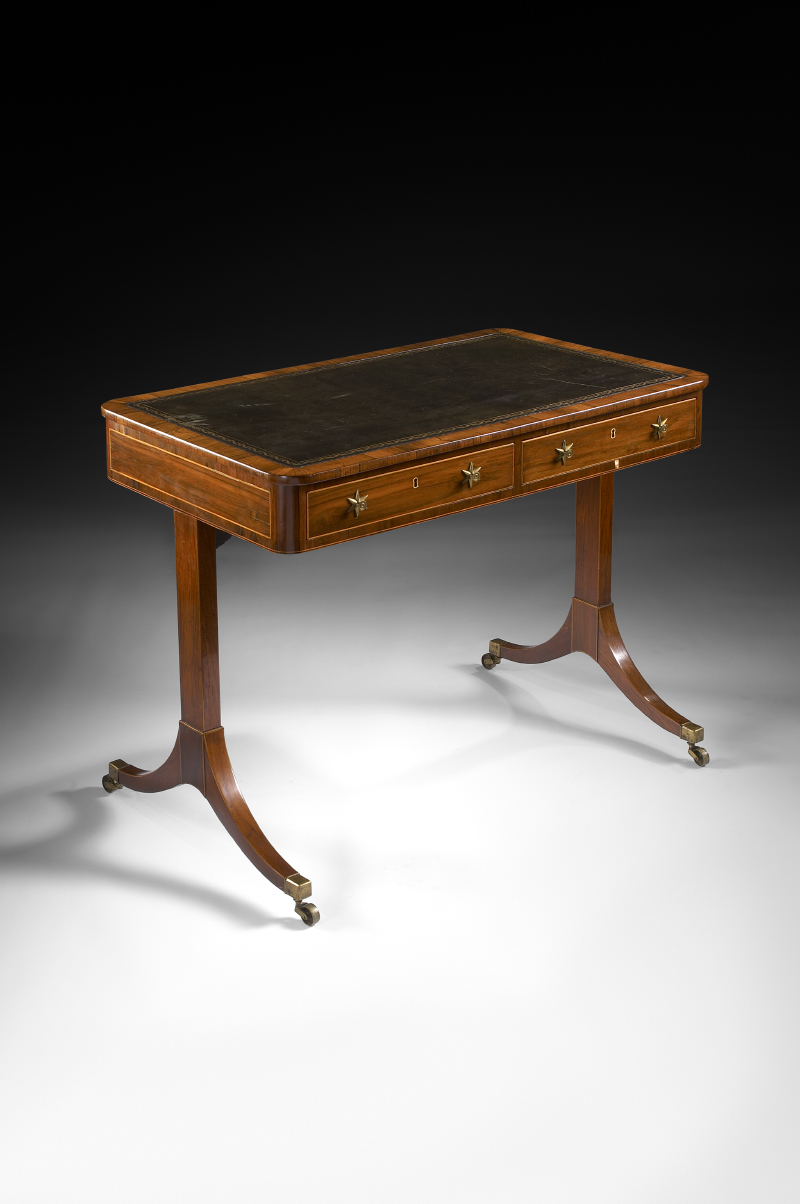 A small Regency period rosewood sofa table