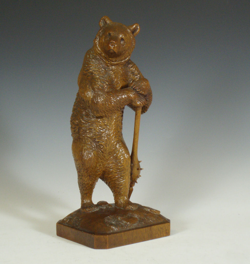 A Swiss 'Black Forest' carved wood bear guard