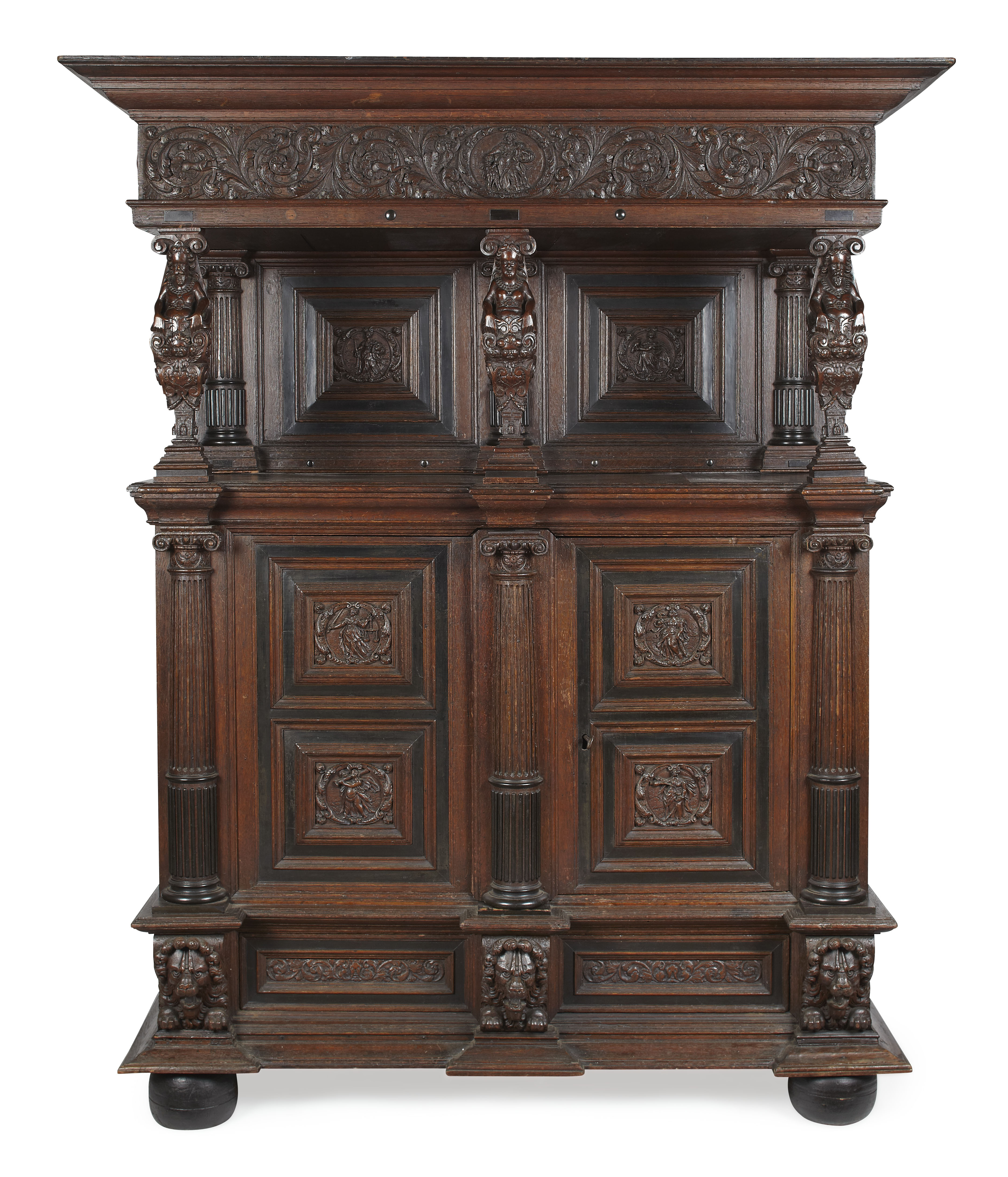FLEMISH CARVED OAK AND EBONISED 'BEELDENKAST' CUPBOARD