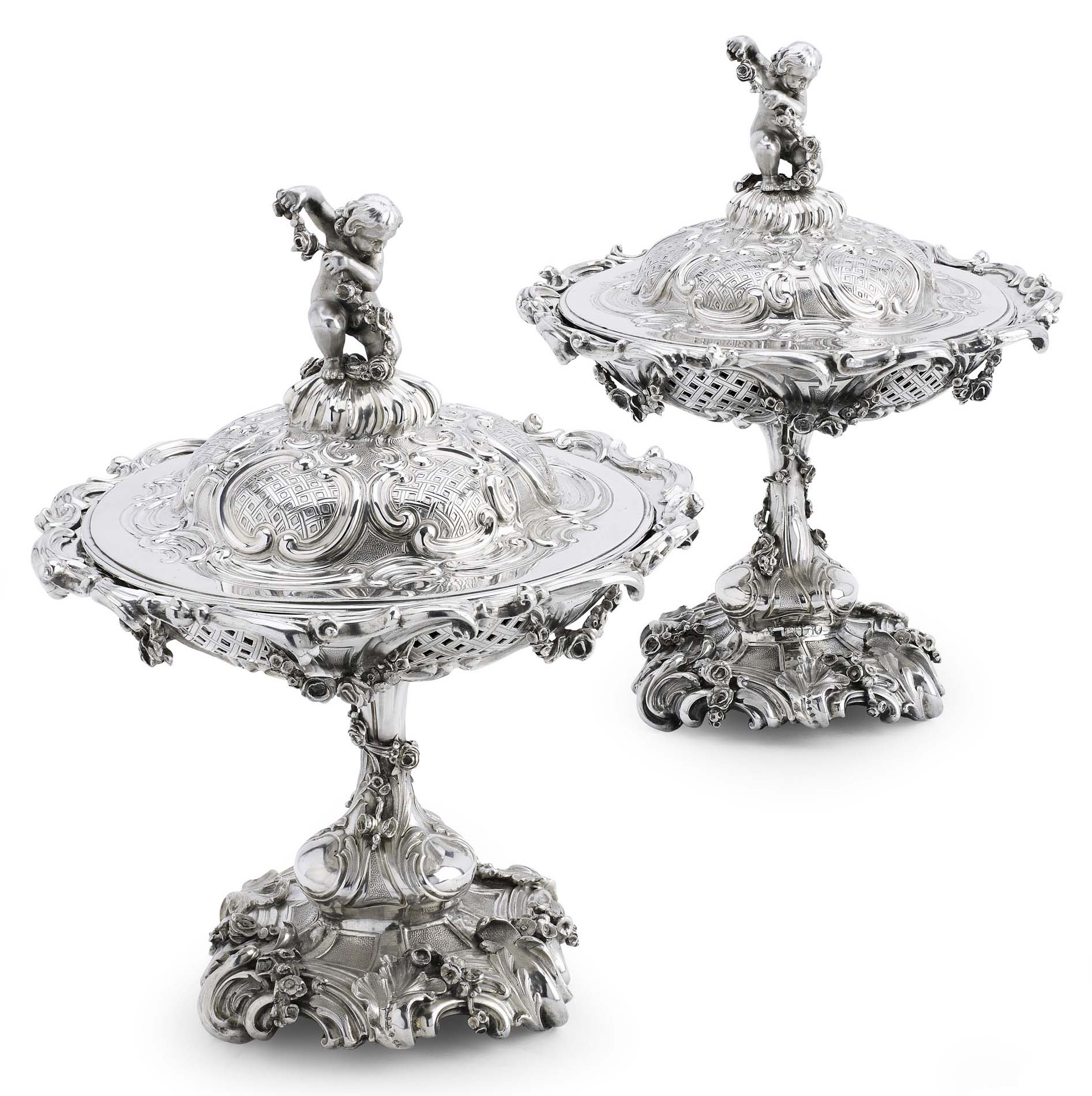 A pair of Victorian silver bon-bon dishes with covers