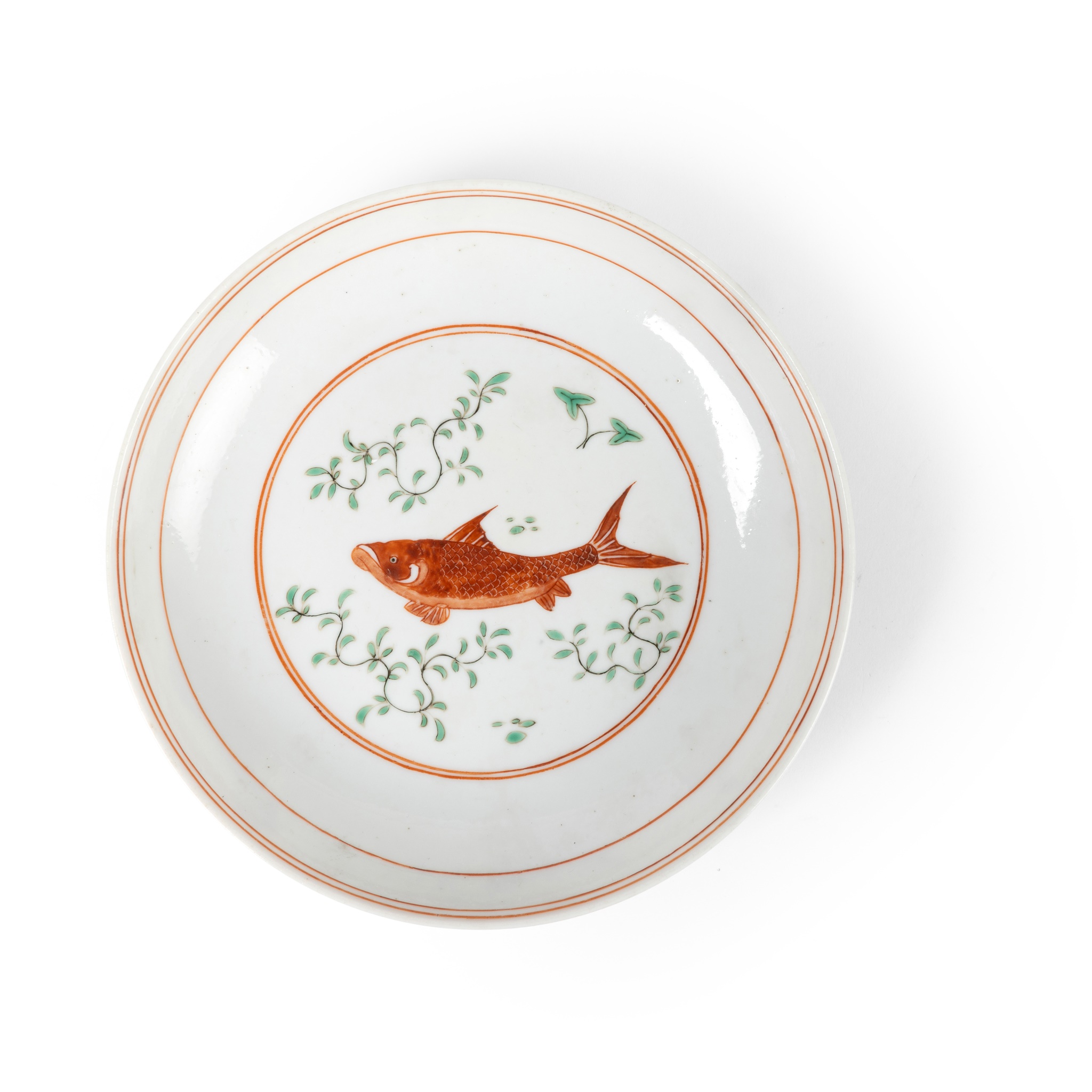 IRON-RED AND GREEN-ENAMELLED 'FISH AND SEAGRASS' PLATE