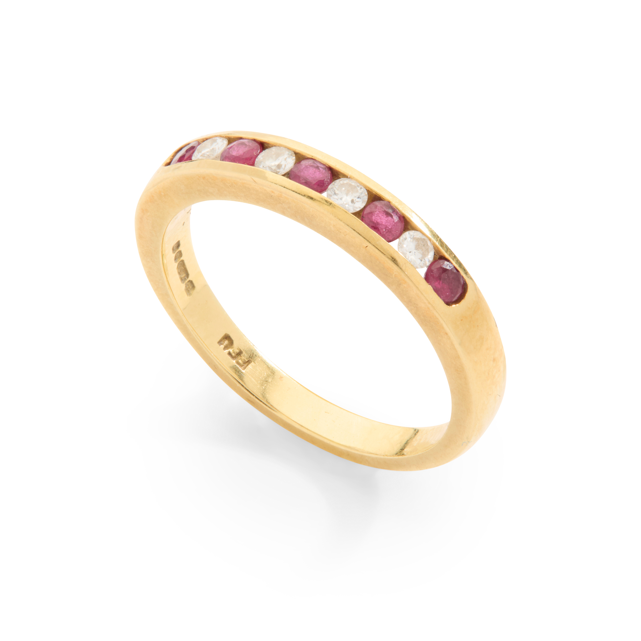 An 18ct gold ruby and diamond half-eternity ring