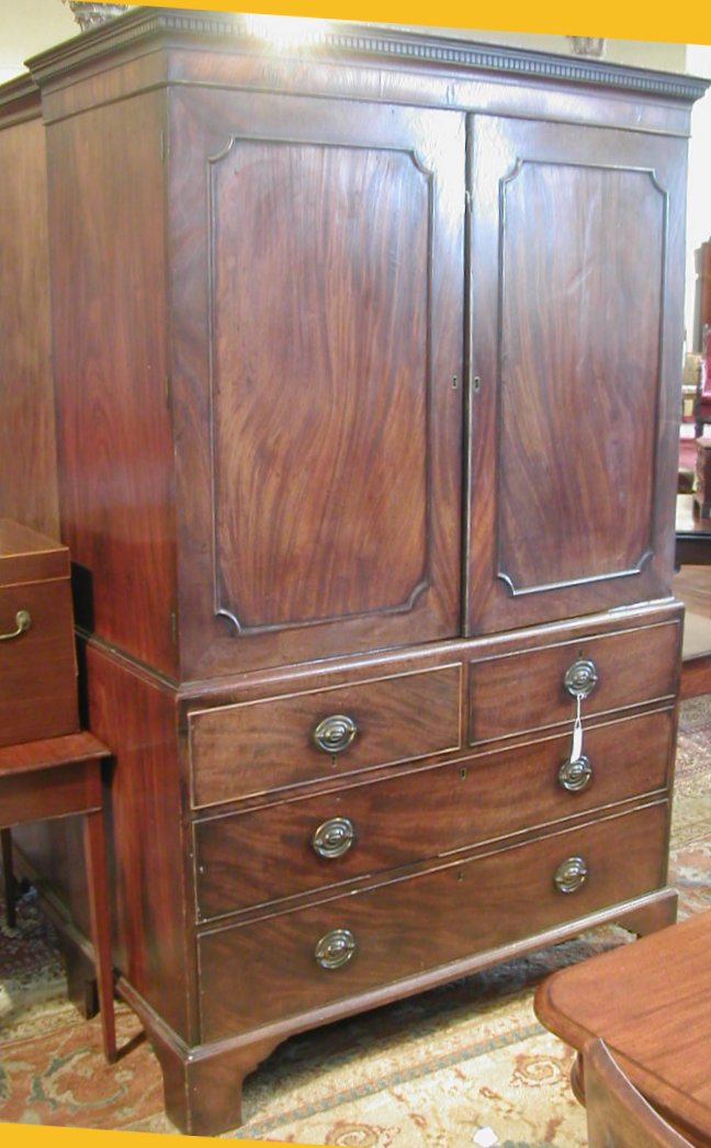 A George III mahogany linen press,