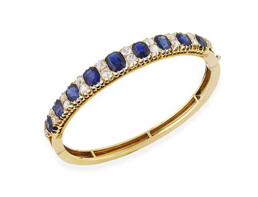 A late Victorian sapphire and diamond set hinged bangle