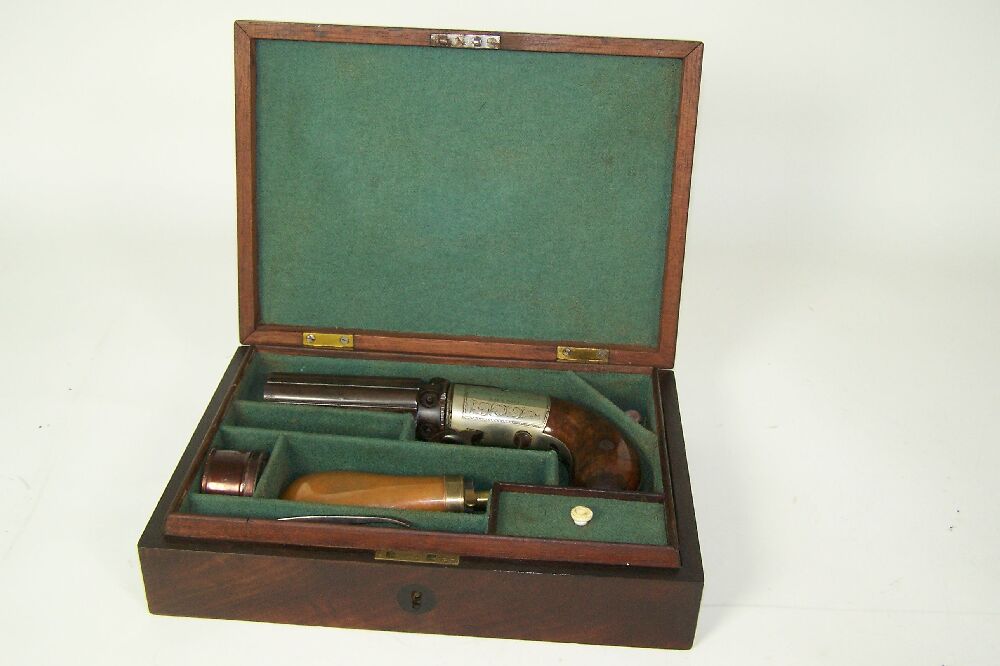 A 19th century English pepperbox six barrelled percussion pistol