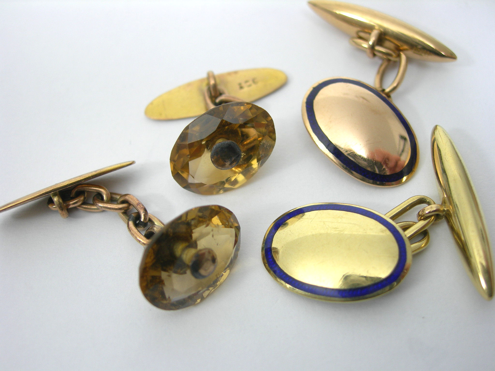 A pair of 9ct gold mounted cufflinks,