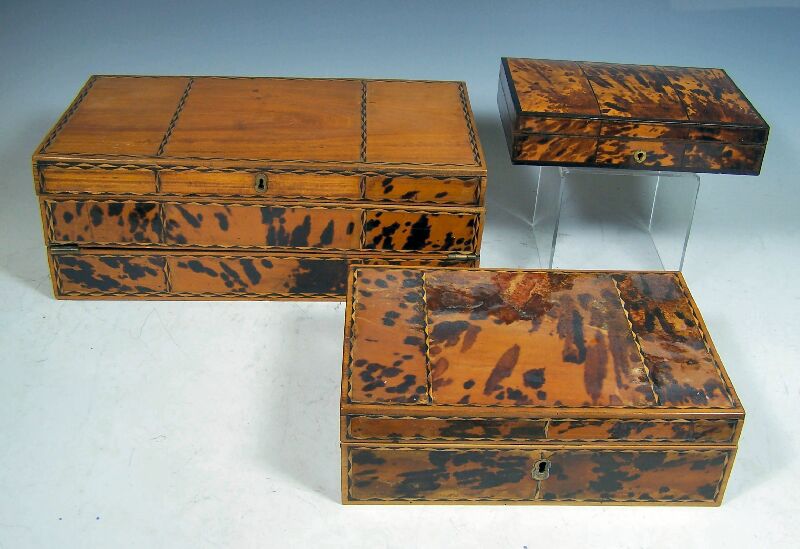 A tortoiseshell veneered writing box