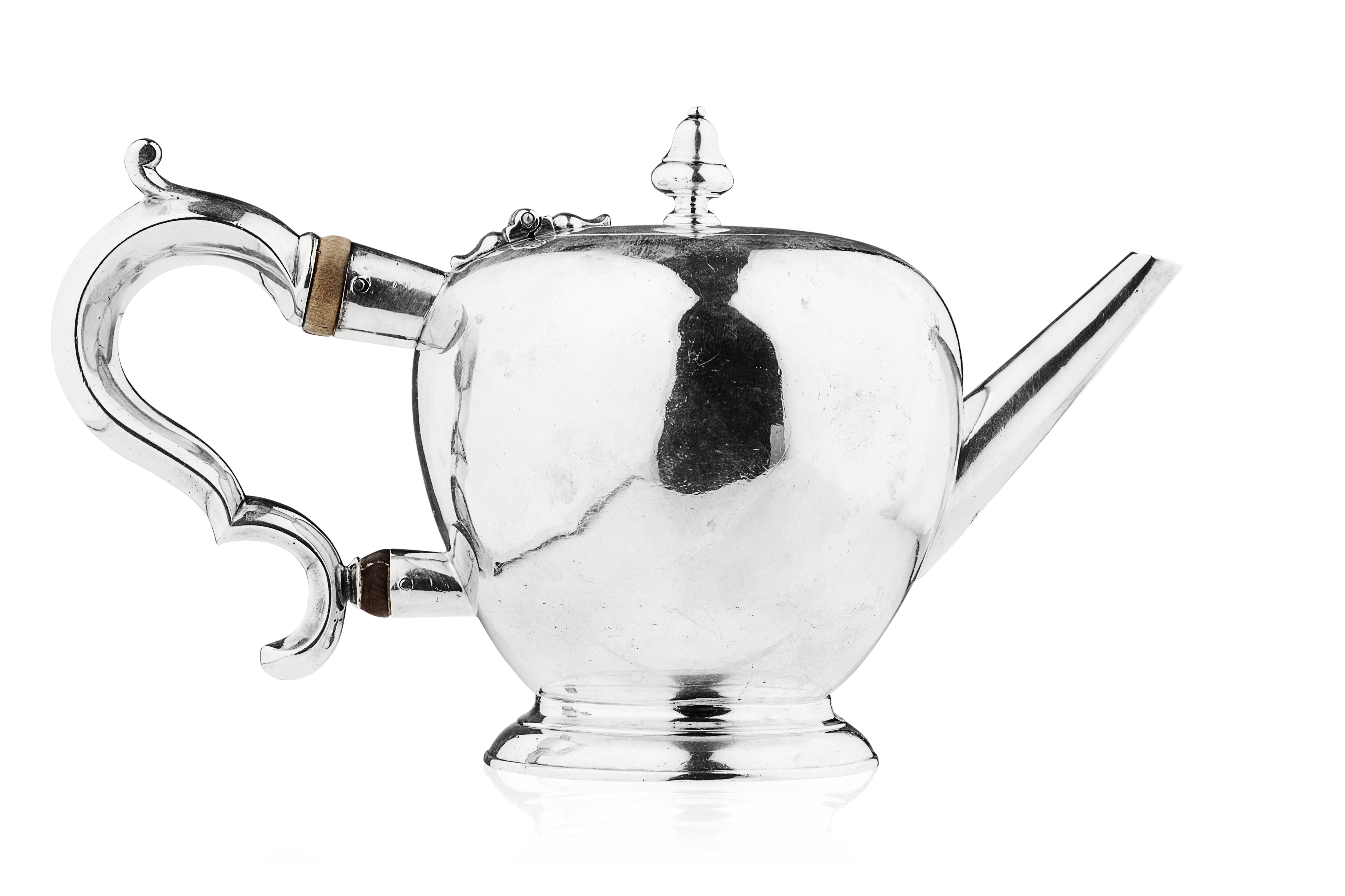 A scarce George I apple formed teapot