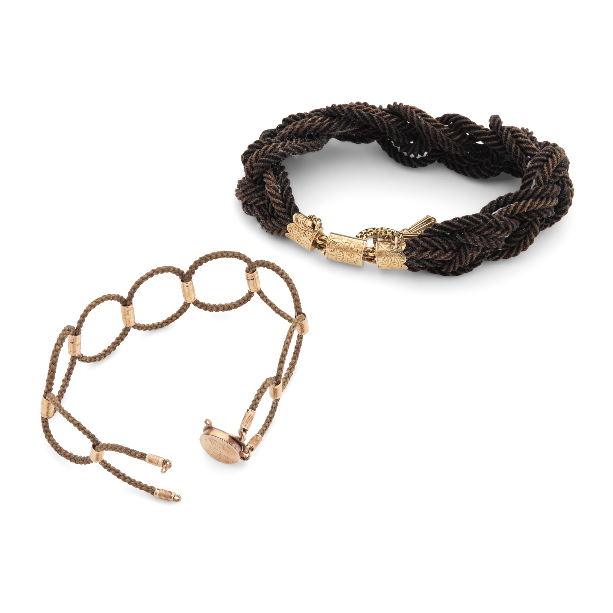 A pair of mid 19th century braided hair mourning bracelets