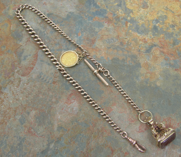 Of Masonic interest - a 9ct gold curb link Albert chain,