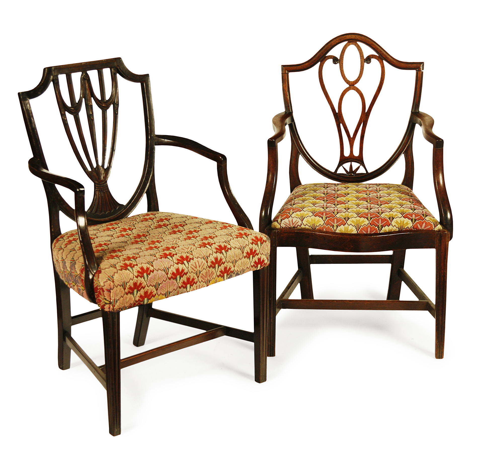 TWO GEORGE III MAHOGANY SHIELD BACK OPEN ARM CHAIRS