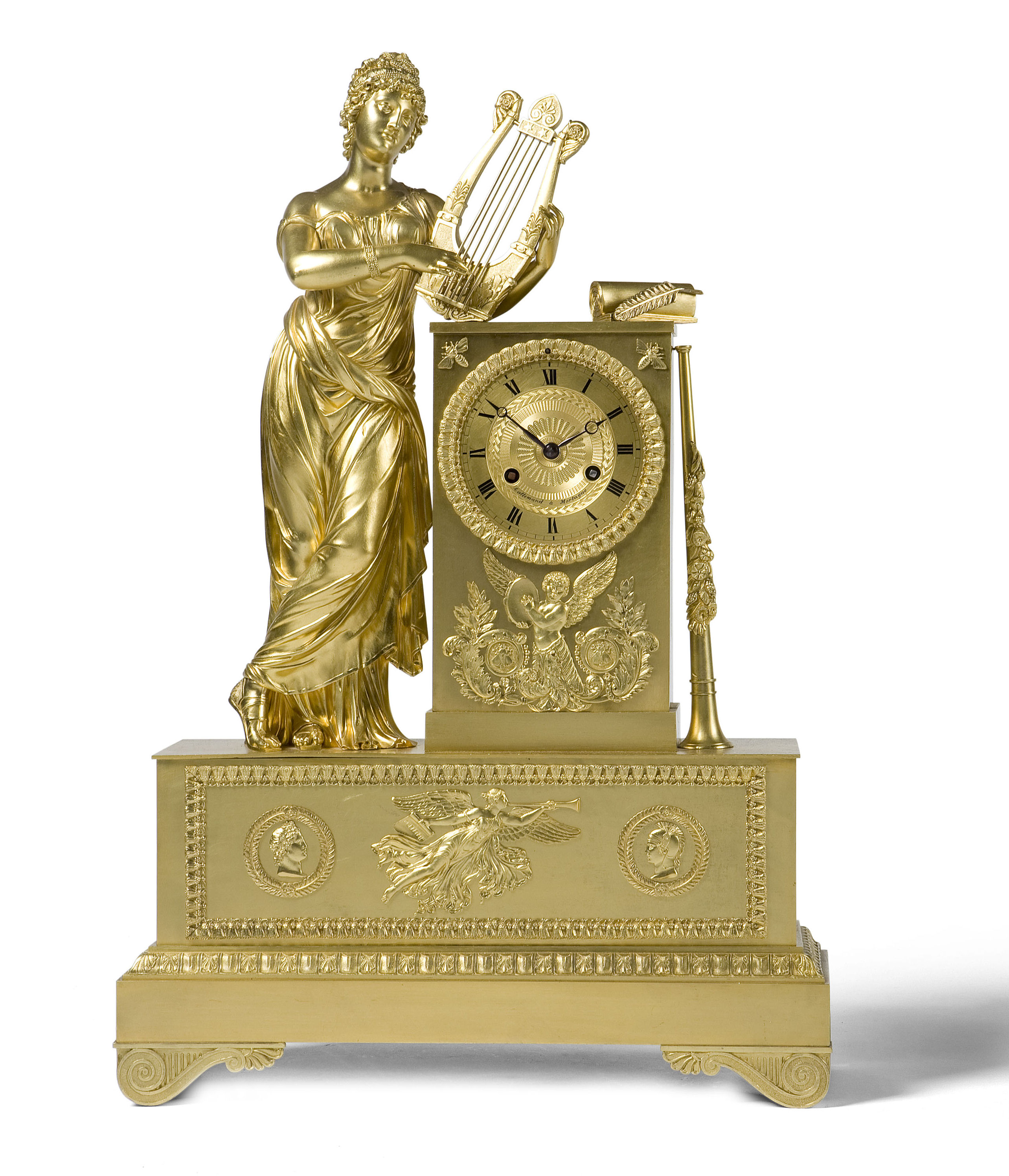 An early 19th century French ormolu figural mantel clock