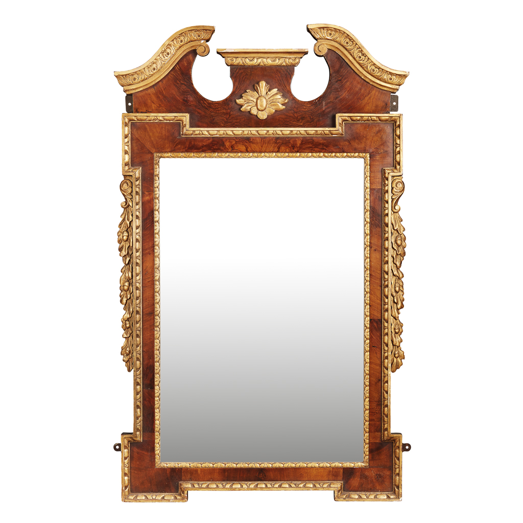 GEORGE II STYLE WALNUT AND PARCEL GILT MIRROR