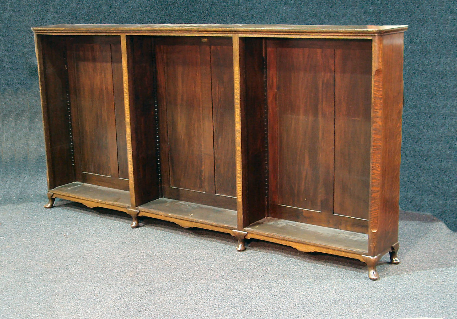 A Whytock and Reid oak open low bookcase