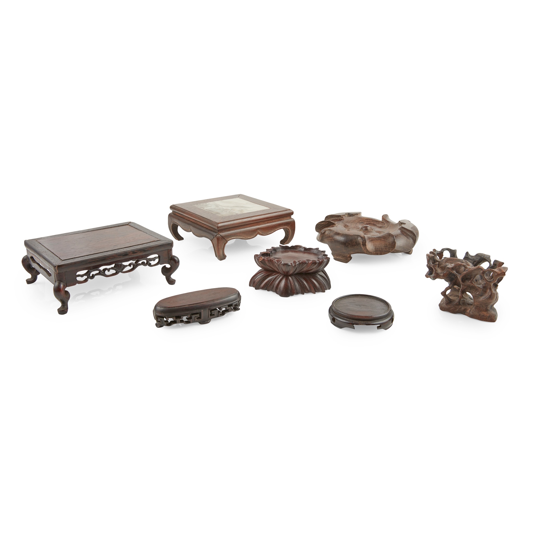 COLLECTION OF SEVEN WOODEN STANDS