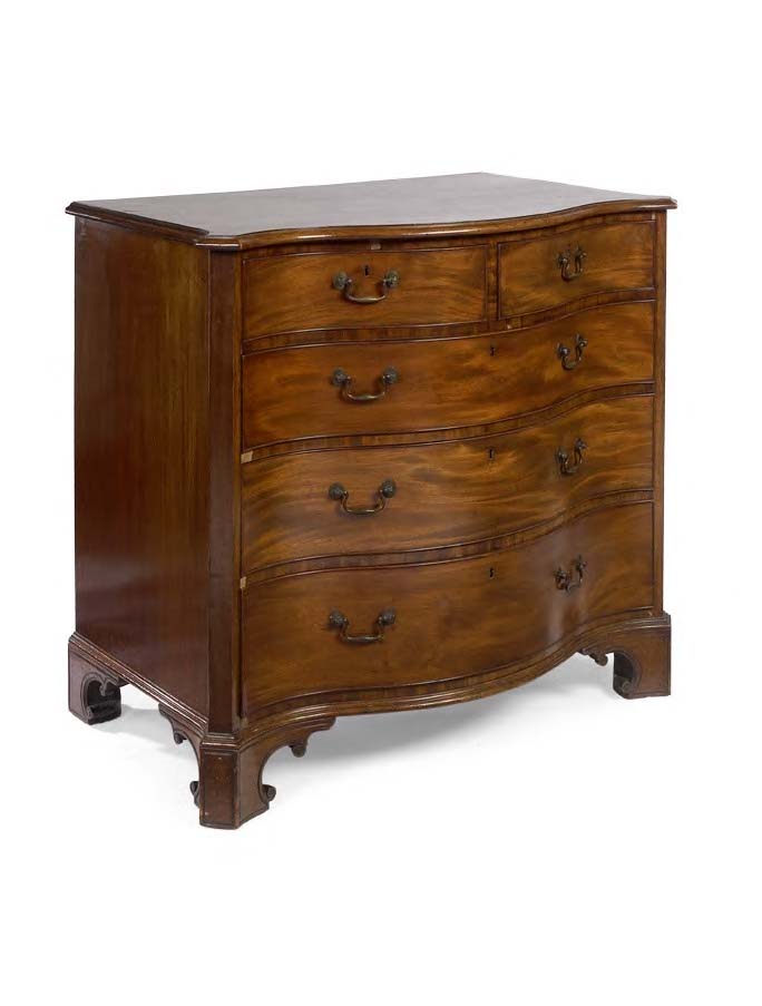 A George III period mahogany serpentine chest of drawers