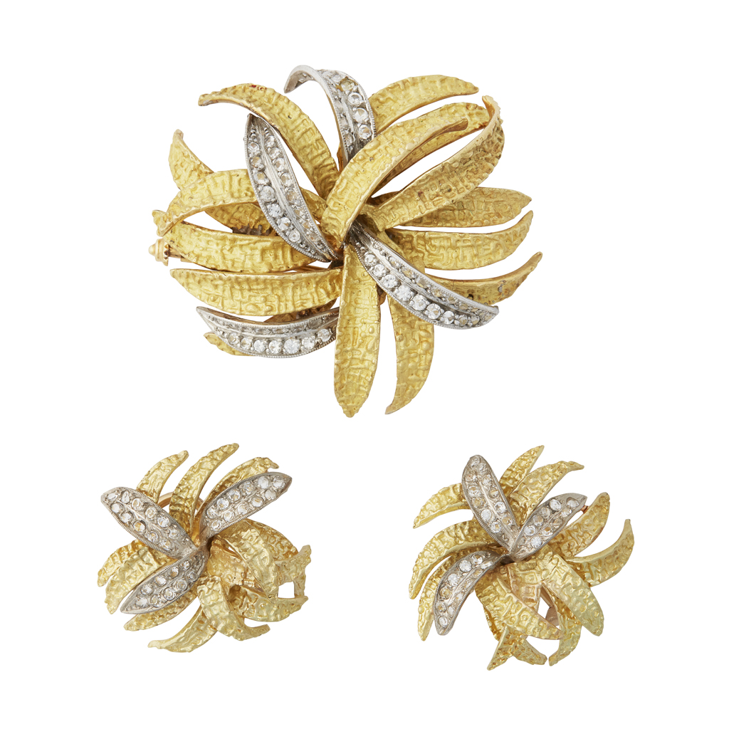 A mid 20th-century diamond set brooch and earrings