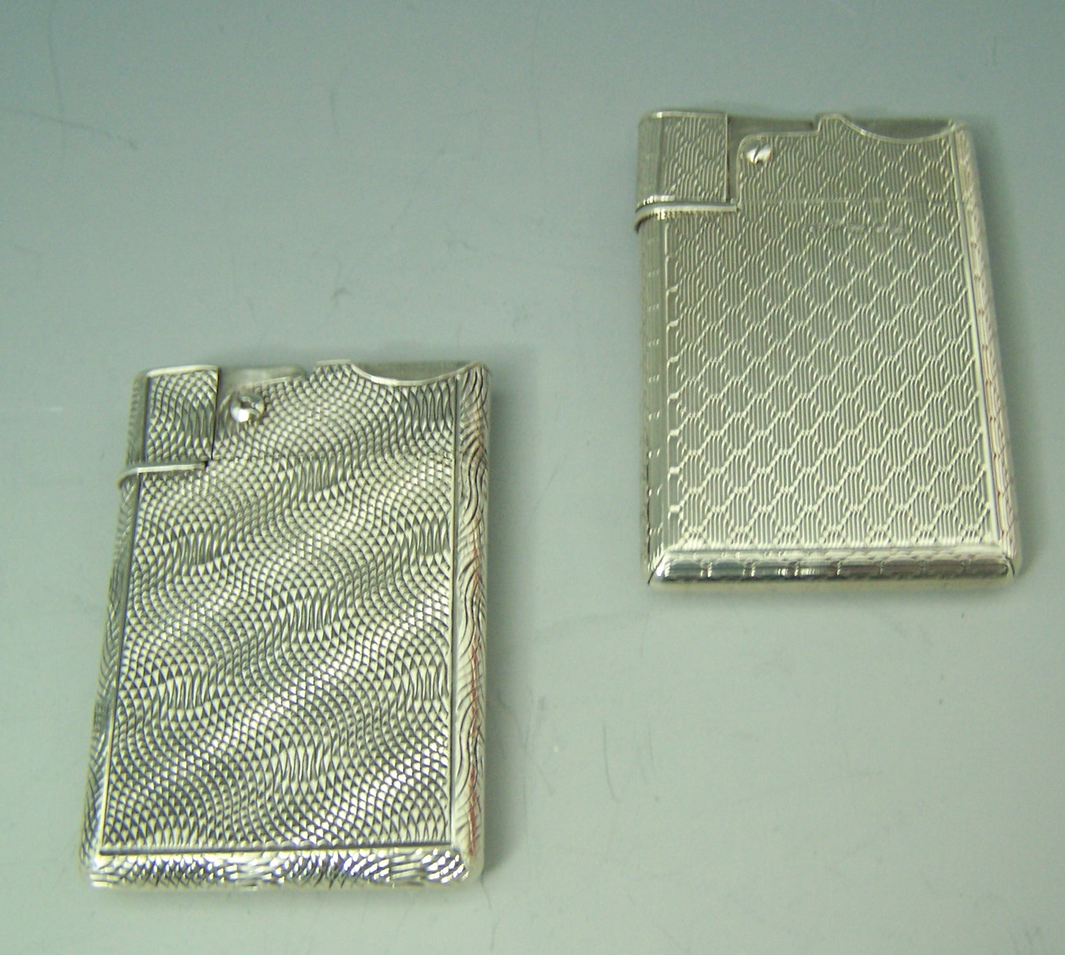 ASPREY & CO. LTD - a 1960's engine turned silver lighter,