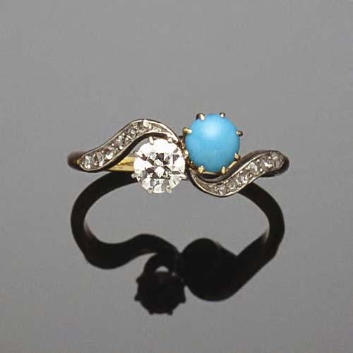 An early 20th century turquoise and diamond two-stone ring,