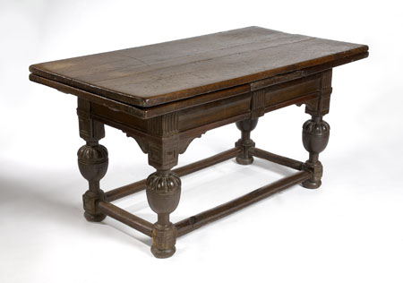 A 17th century oak drop leaf refectory table