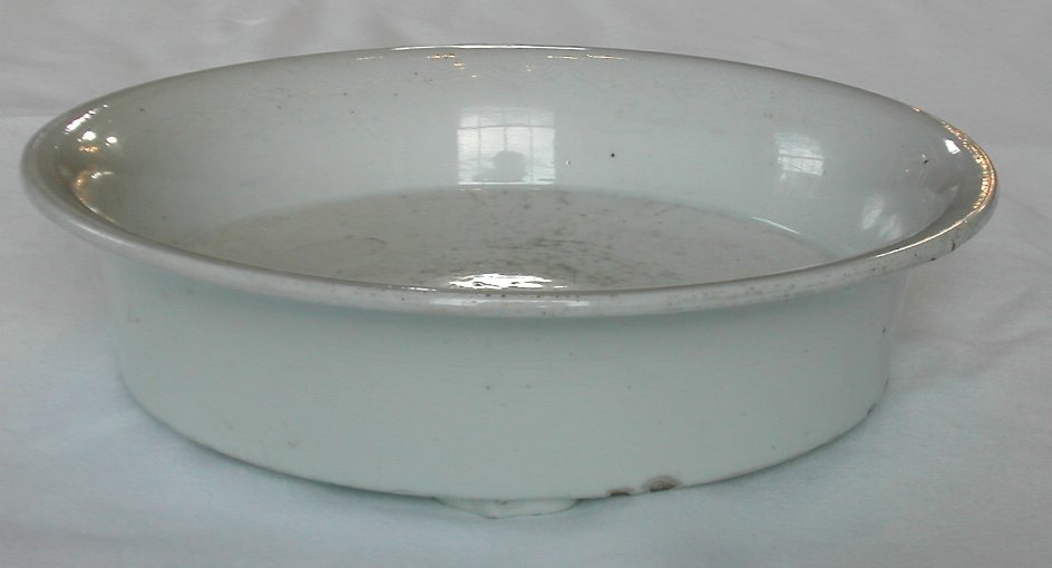 A circular Anhua decorated white glazed shallow tripod censer, 18th century,