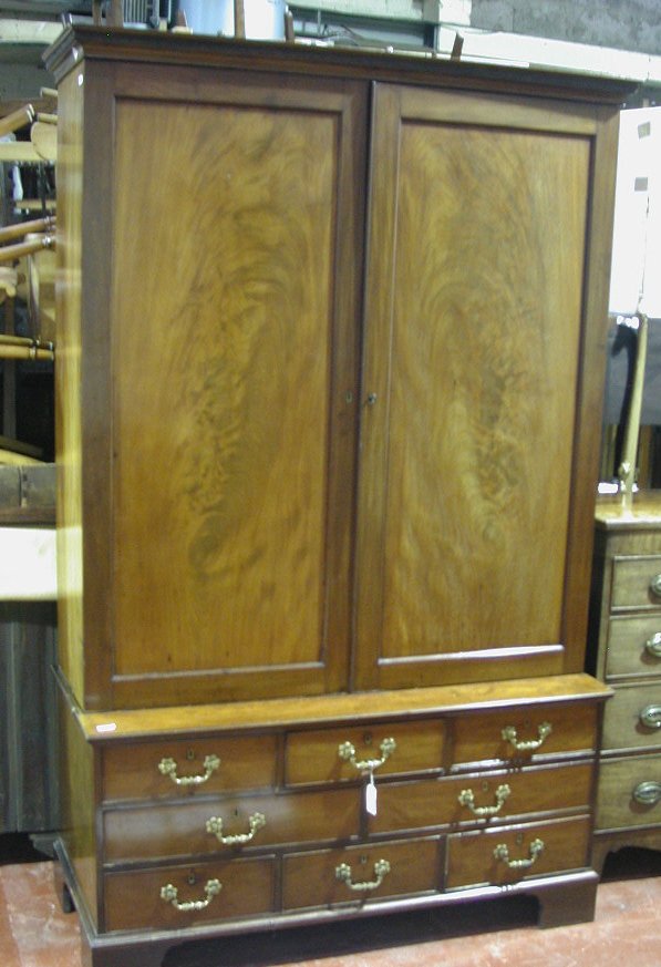 A mahogany wardrobe,