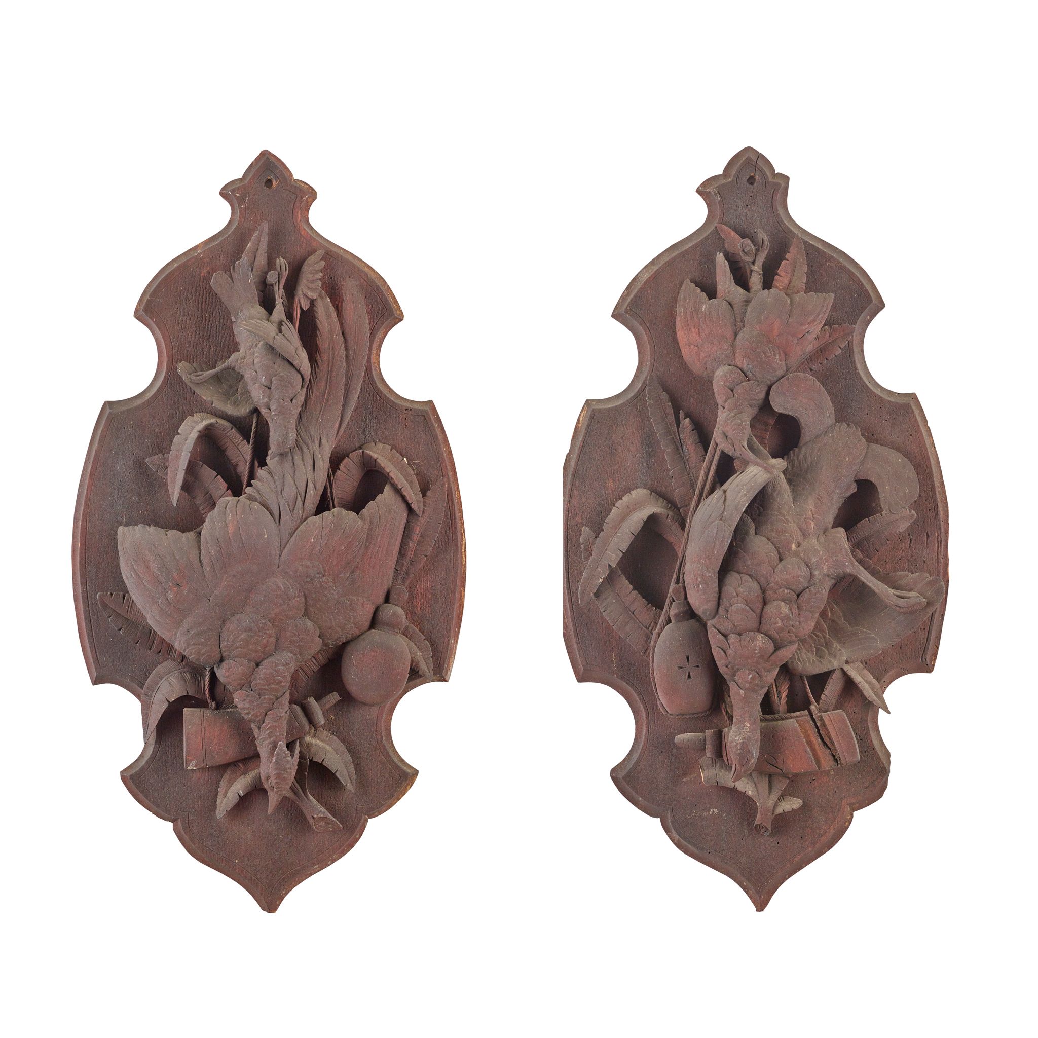 PAIR OF BLACK FOREST CARVED HUNTING TROPHY WALL PLAQUES