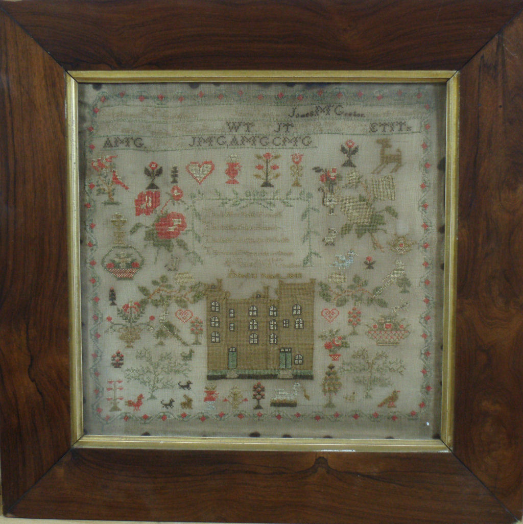 A Victorian sampler of a castle By M Gretor, aged eleven years, 1843