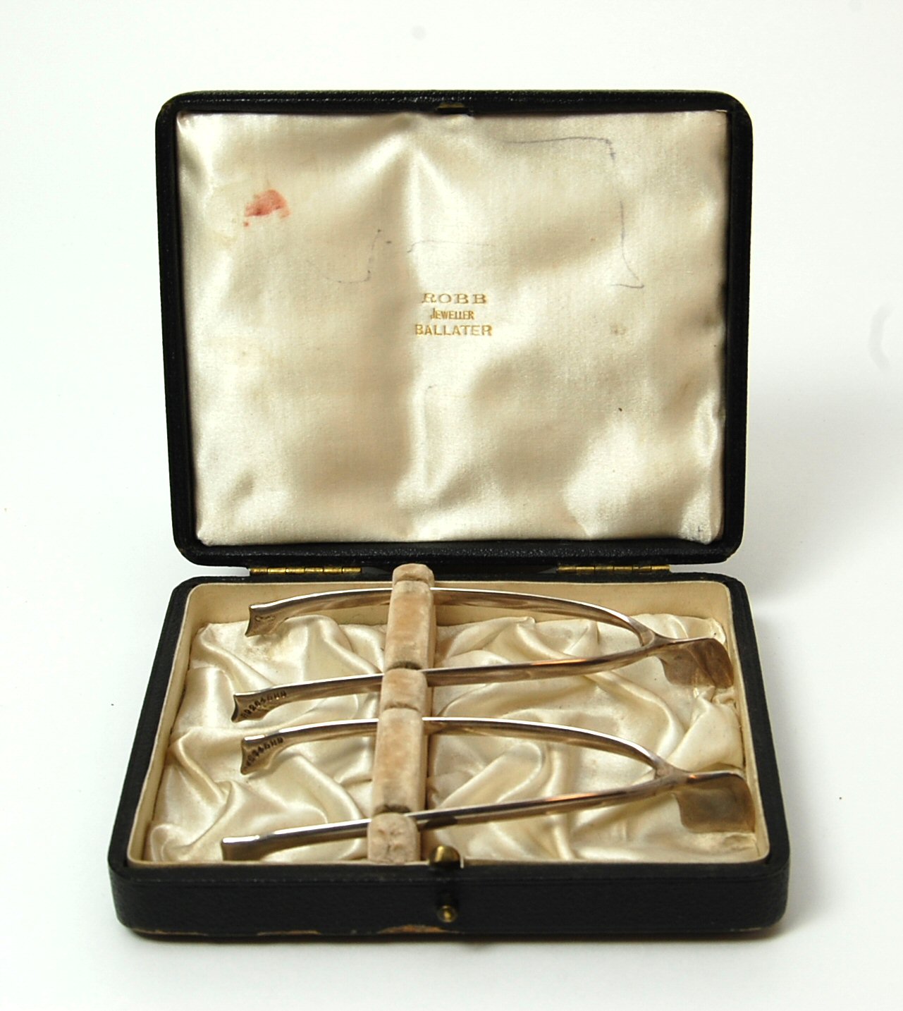 Ballater - two pairs of Scottish provincial silver Merrythought sugar tongs in original case