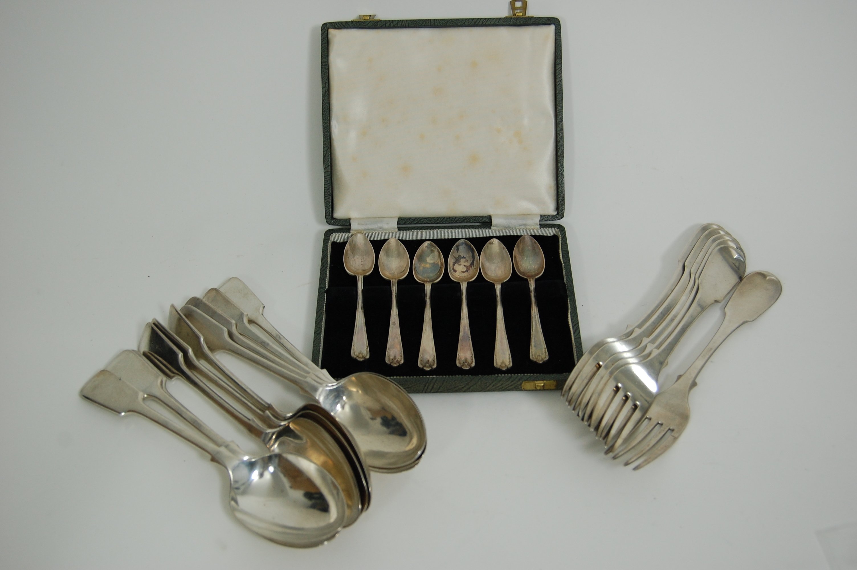 A set of ten tablespoons