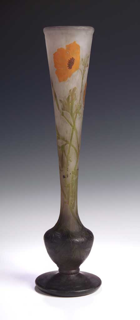 A Daum etched and carved glass vase,