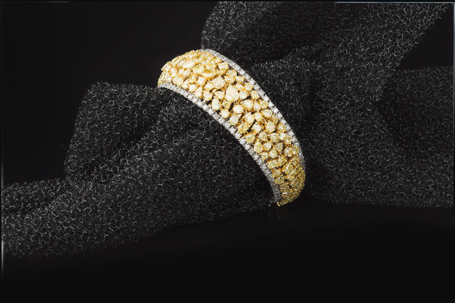 A fancy yellow and colourless diamond set bracelet